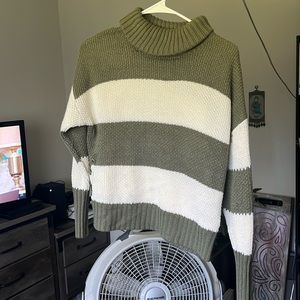 Knitted green and white sweater